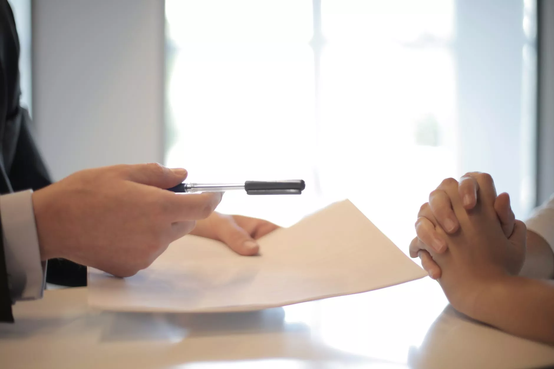 Best Guide to General Insurance 2025: Types, Coverage, and Everything You Need to Know crop businessman giving contract to woman to sign
