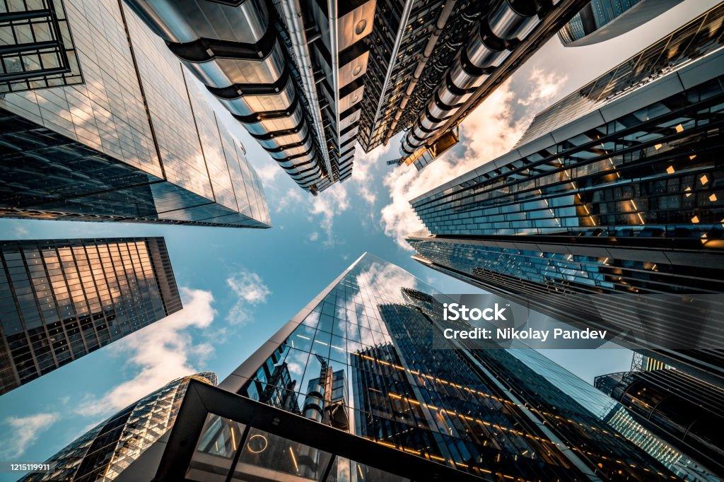 Is building insurance worth it? Shocking Truth (2025) looking up view of tall buildings